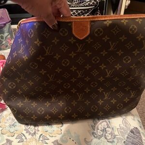 Louis Vuitton Delightful in good used condition.